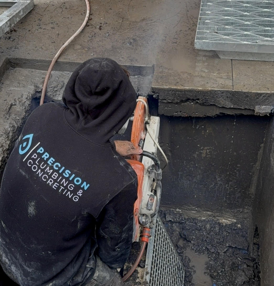Council drainage pit reconstruction — Concrete removal and reconstruction of a council drainage pit with new grate set-in