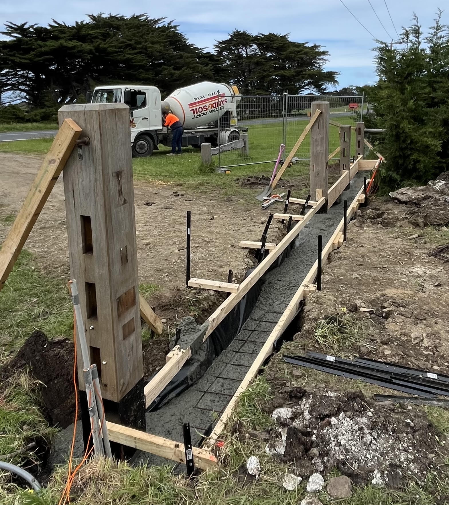 Rural footings pour — Formed and reinforced footings poured on a rural property entry