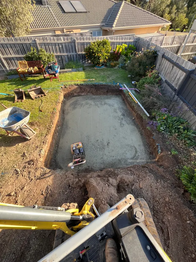 Pool excavation and base prep — Backyard pool dig, compacted base and tight-access spoil removal